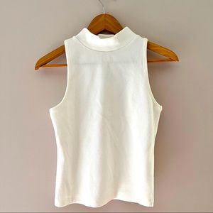 Sleeveless cropped mock turtleneck top